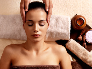 Woman having massage in the spa salon