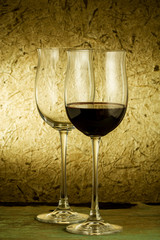 red wine and glass on a old paper background