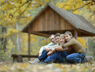 Happy family in the autumn park