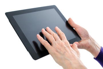 old hand on  digital tablet