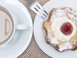 Cup of coffee with cake