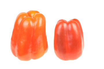 Two bright red peppers