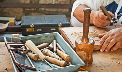 Hand with tool blured in motion
