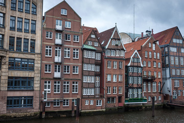 Fototapeta na wymiar Traditional buildings along canal in Hamburg, Germany