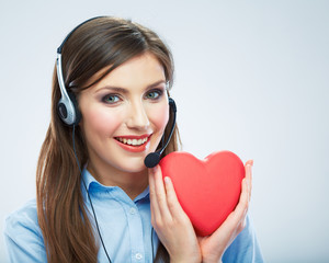 Woman call center operator hold love symbol Red heart. Close up