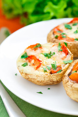 Mushrooms stuffed with mozzarella and tomato
