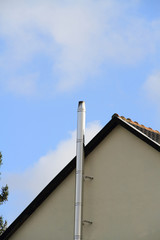 Haus mit Edelstahlkamin