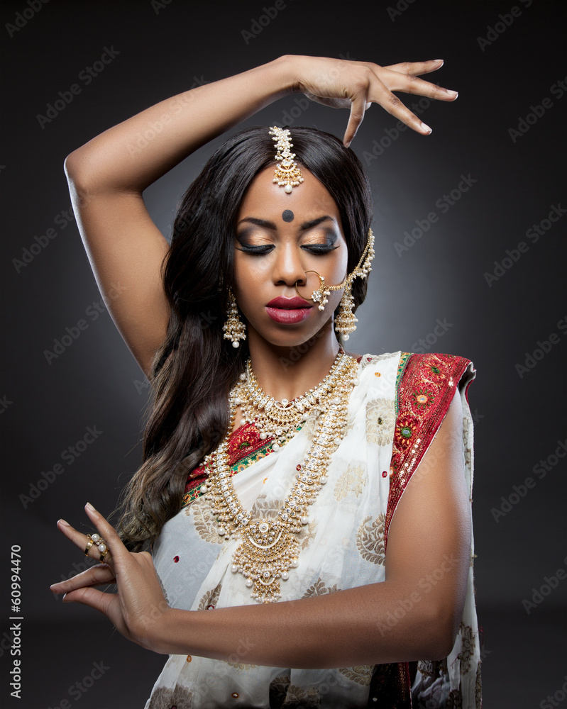 Wall mural indian woman in traditional clothing with bridal makeup