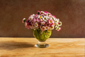 Still life bouquet daisies wooden table