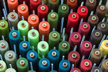 Fototapeta premium Reels with colorful threads