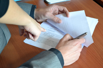 People signing contract