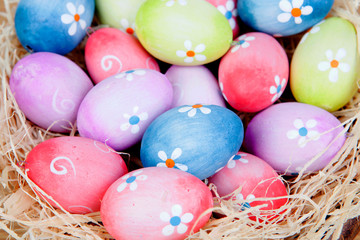 Fototapeta na wymiar Easter eggs decorated with daisies