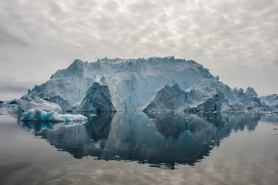 Reflection of icebergs in Disko bay, North Greenland