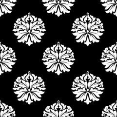 Arabesque pattern of floral motifs on black