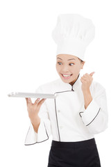 smiling female chef, cook or baker  showing thumbs up