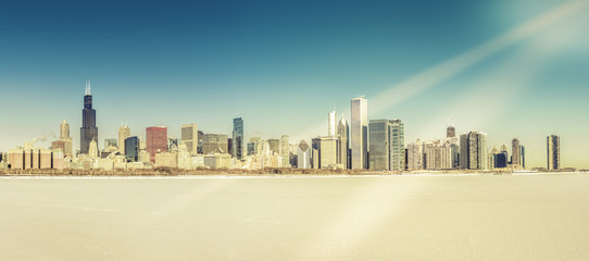 Chicago downtown winter panorama with frozen snow Lake Michigan