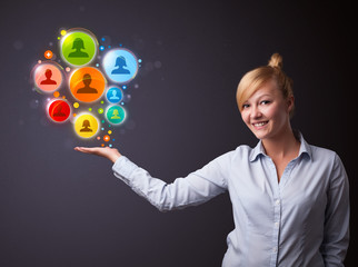 Social network icons in the hand of a businesswoman