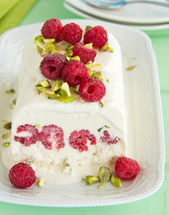 Yoghurt Semifreddo with raspberry and pistachio.
