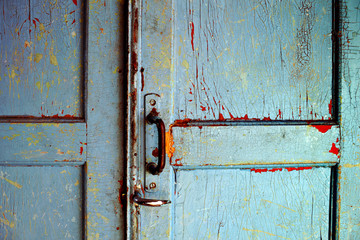 Old door with handles and locks