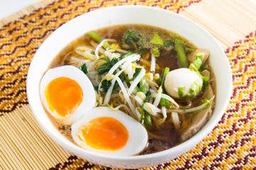Thai noodle with meatball and boiled egg