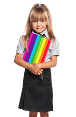 Little girl with exercise books