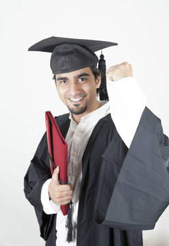 Asian student graduate raising his hand