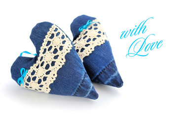 Two decorative jeans heart on a white background