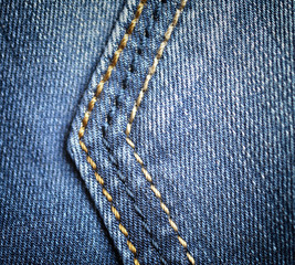 Texture of blue jeans. Close-up