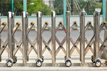 Iron sliding fence with wheel.