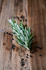 Fresh rosemary and black peppercorns