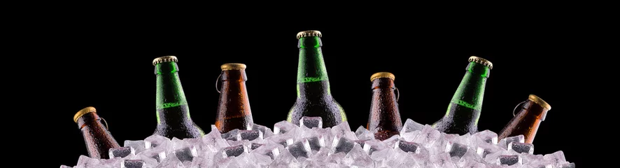 Fotobehang Bier flessen bier op ijs
