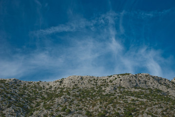 Stone Mountains and Blue Sky with clouds
