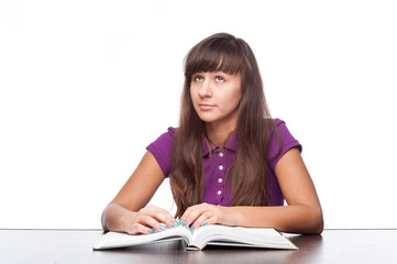 thoughtfull girl with book