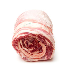 Fototapeta premium Rolled lamb breast joint,isolated on a white studio background.