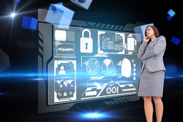 Composite image of focused businesswoman