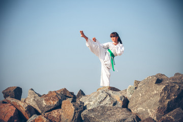 Young girl training karate
