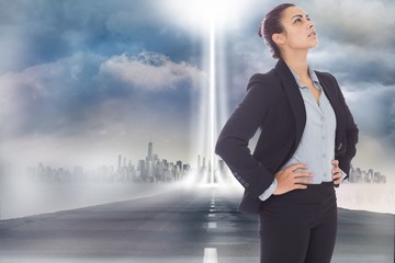 Composite image of serious businesswoman