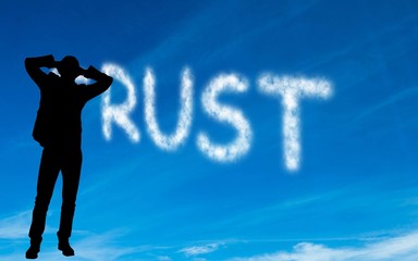 Composite image of trust written in white in sky