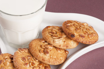 Homemade cookies with nuts and milk