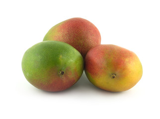 Three ripe tropical fruit mango isolated on white close up