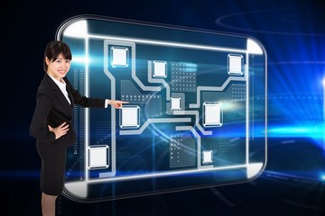 Composite image of businesswoman pointing
