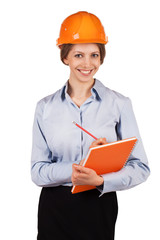 Cute woman engineer in protective helmet