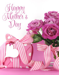 Beautiful pink gift and roses Mothers Day presents