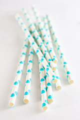 Paper drink straws on white background