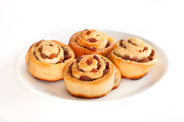 Group of delicious swirl buns with raisins and brown sugar
