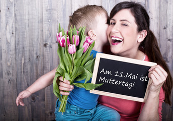young boy celebrating mothers day