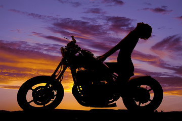 Fototapeta na wymiar silhouette woman motorcycle head way back