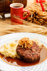 beef cutlet with mashed potatoes and cabbage