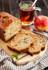 Apple nut cake on wooden board