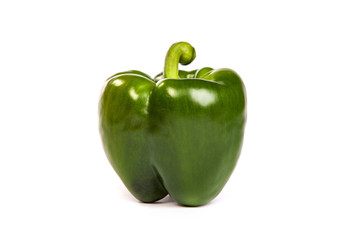 A green sweet  bell pepper isolated on white